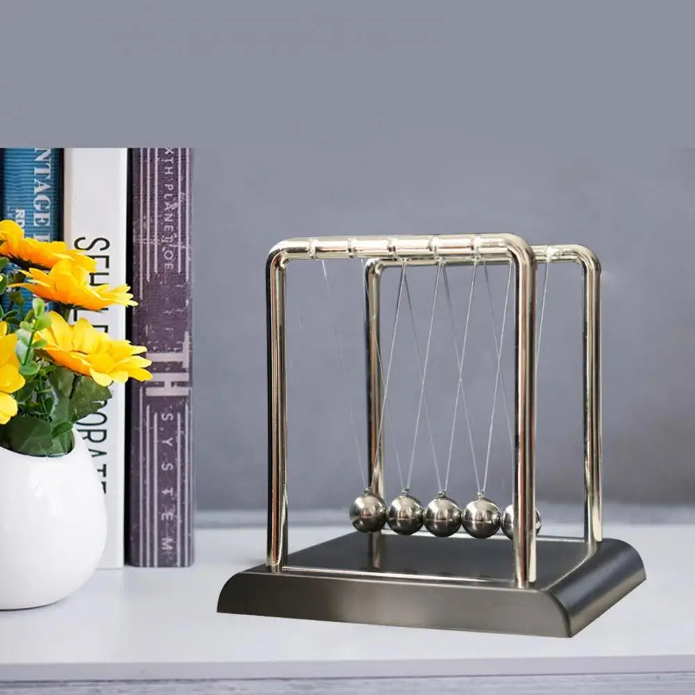 Cuna de Newton de metal/Ley de Newton.